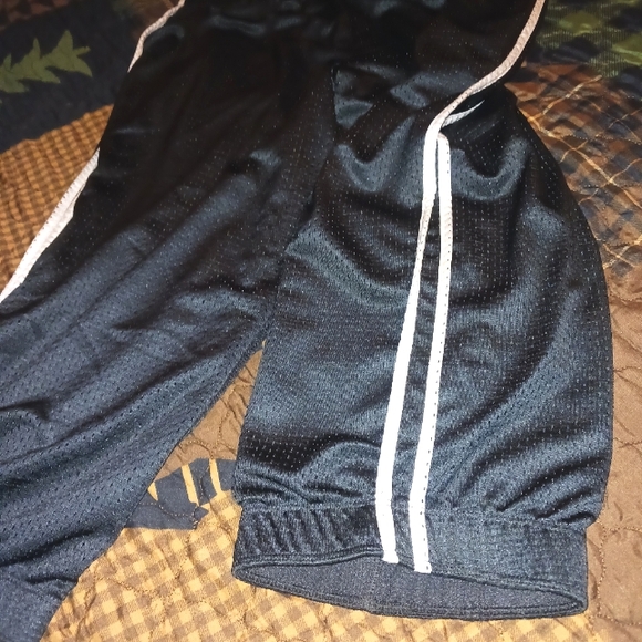 Nike Reversible Cropped Nylon Joggers - Picture 7 of 12
